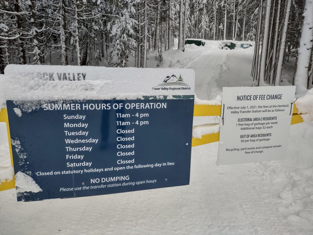 Opening hours sign posted on front gate of Hemlock Valley Transfer Station